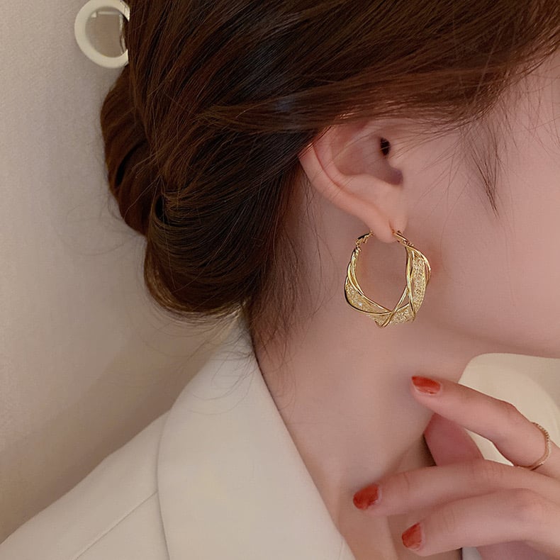 🔥 49% KORTING – Mode Twist Oorbellen